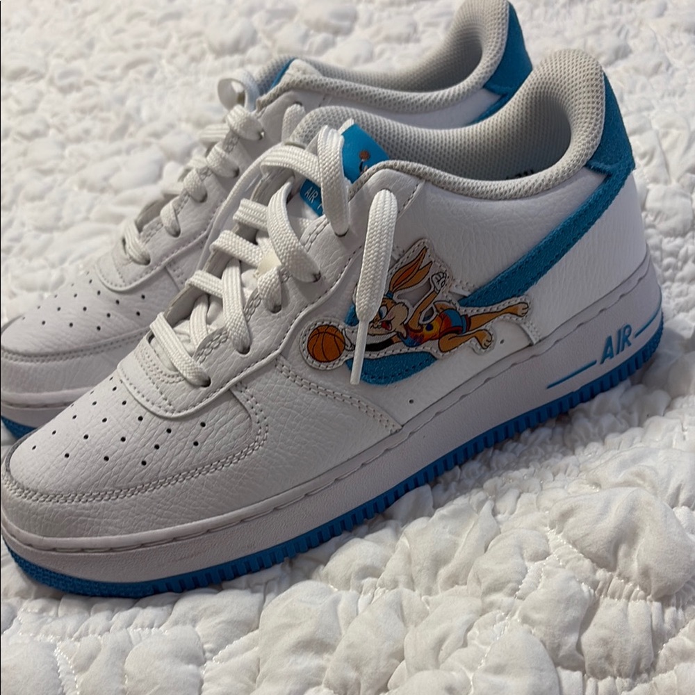 Nike White and Blue Sneakers with Classic Design
